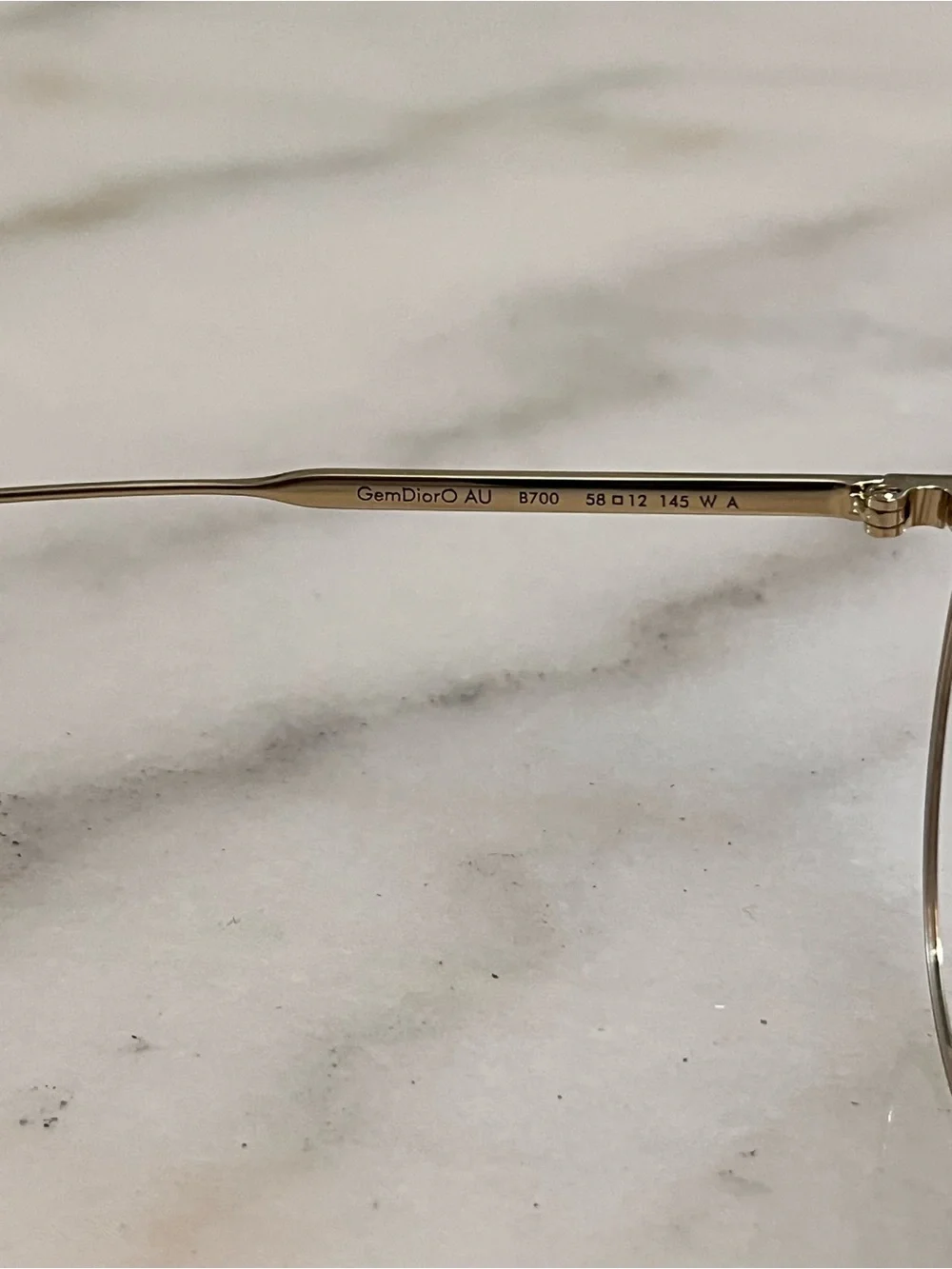 Eyeglasses on Marble Surface